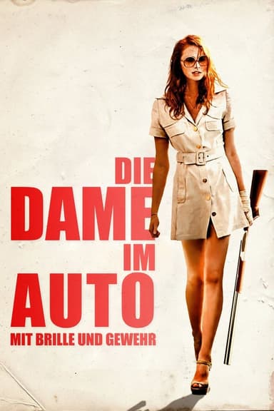 Die Dame im Auto mit Brille und Gewehr